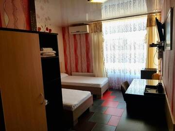 Двухместный номер с 2 отдельными кроватями и душем в Отеле Hotel Nariman